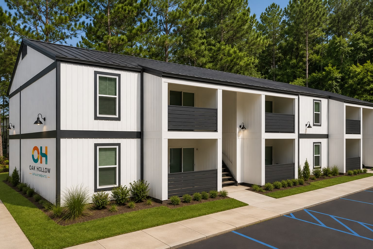 Oak Hollow Apartments buildings framed by mature live oak trees